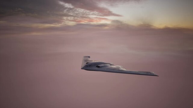 Stealth Bomber Flying At Sunset