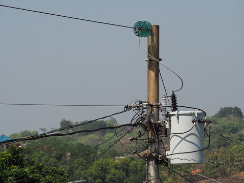View of electrical panel and transformator at outdoor with blurred background. Electrical photography concept design. Three phase and One Phase 20 KV transformator.