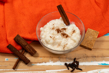 Canjica sweet corn pudding made with sugar milk and cinnamon typically served during festivals
