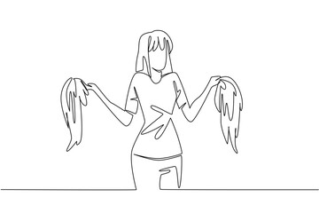 Continuous one line drawing a woman in casual clothes holding 2 wigs. Confused between two good choices. Stunning and different. National Wig Out Day. Single line draw design vector illustration