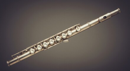 Fototapeta premium Silver Flute on Gray Background, Musical Instrument Detail.