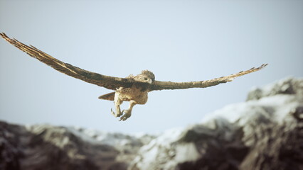 A powerful eagle glides gracefully through the air, wings fully extended. Below, jagged mountain peaks rise against the backdrop of a soft blue sky, evoking a sense of freedom.