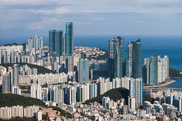 Obraz premium Busan city panorama beautiful skyline view from Hwangnyeongsan mountain observatory, Busan port, Gwangan bridge and harbor bay, South Korea, Yeongnam district, sunny day, travel to Republic of Korea
