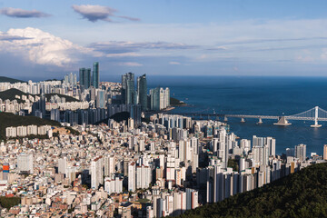 Fototapeta premium Busan city panorama beautiful skyline view from Hwangnyeongsan mountain observatory, Busan port, Gwangan bridge and harbor bay, South Korea, Yeongnam district, sunny day, travel to Republic of Korea