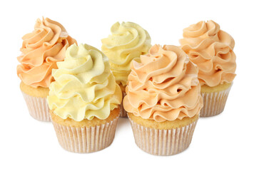 Delicious cupcakes with colorful cream isolated on white
