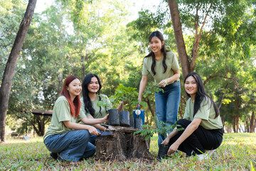 The volunteers show responsibility and teamwork as they collaborate to plant trees and care for plants. Their efforts support sustainability and conservation, helping earth thrive. Volunteer concept