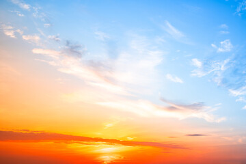 Beautiful , luxury soft gradient orange gold clouds and sunlight on the blue sky perfect for the background, take in evening,Twilight, Large size, high definition landscape photo
