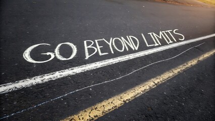 Fototapeta premium Words GO BEYOND LIMITS written with chalk on road surface