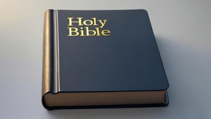 Old holy bible book with cross symbol on cover isolated on white background