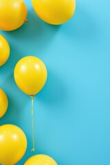 Bright Yellow Balloons Against Blue
