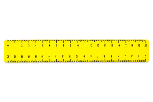 Bright yellow 20 centimeter plastic school ruler isolated on white