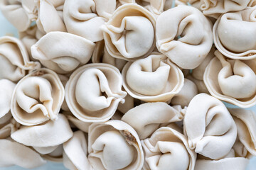 Close-Up of Pelmeni Dumplings on a White Plate
