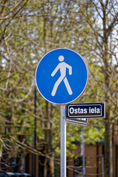 European Blue Round Pedestrian Zone Sign with Street Name Ostas iela