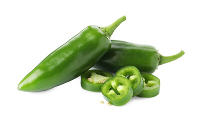 Whole and sliced green jalapeno peppers isolated on white