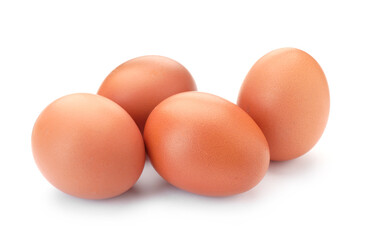 Many raw chicken eggs isolated on white