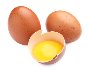 Whole and broken chicken eggs isolated on white