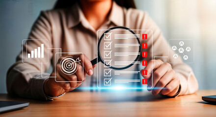 Audit checklist with magnifying glass for business quality control and process improvement strategy plan