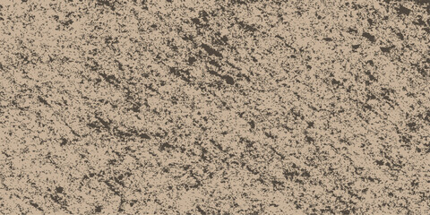 Close-up of a rough, natural stone wall texture with brown and sand colored rock for a textured background and surface pattern