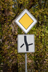 European Priority Road Sign Indicating Main Road Straight with Diagonal Side Roads
