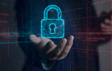 Cybersecurity concept. Businessman's hand holding a glowing digital padlock icon made of a plexus network, symbolizing data protection and secure technology.