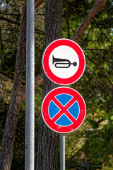 European No Horn Sign with No Stopping Traffic Sign