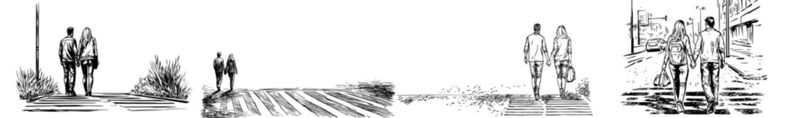 The silhouette of a couple hand in hand as they walk across a crosswalk is perfect for romantic themes