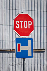 European Stop Sign with Straight Ahead Road and Dead End Left