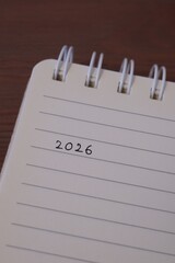 close up of a bloc note with 2026 written
