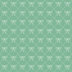 Light green patterned fabric with repeated white bow motifs creates a soft and charming design for various textile applications