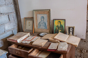 Interior View of an Old Orthodox Church on Vardiani Island, Kefalonia, with Icons and Dusty Religious Books