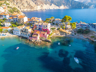 Aerial Panoramic View of the Colorful Seaside Village of Assos and its Harbor in a Tranquil Kefalonia Bay