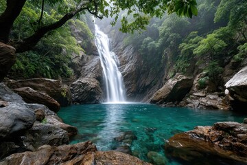 Fototapeta premium Misty Jungle Waterfall and Turquoise Pool