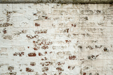 Old medieval cement brick fortress white wall.