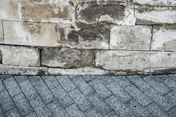 Old medieval cement brick fortress white wall. Texture grunge background