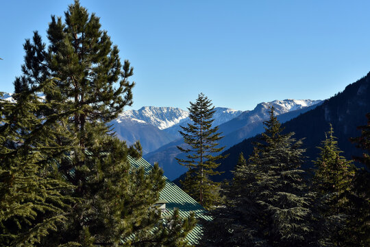 French Alps in Auron, South of France. Snowy mountain top with blue sky in the background. 