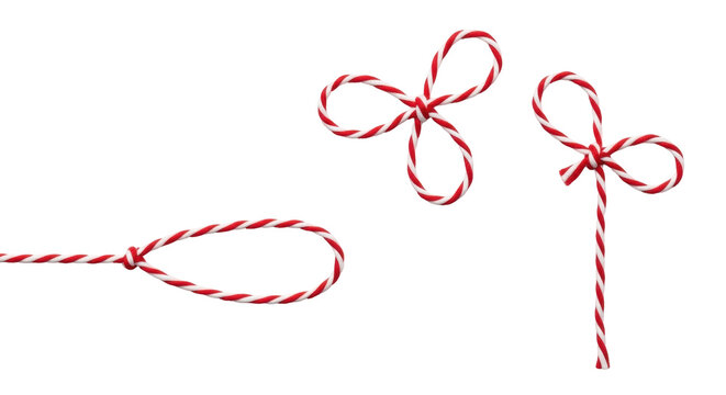Isolated red and white twine bows, candy cane stripe string, craft thread, wrapping ribbon