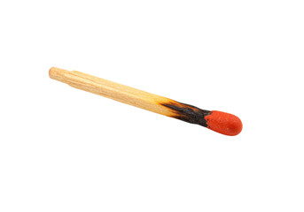 Burnt matchstick isolated on transparent PNG, wooden stick with red head and charred remains for fire safety and camping concepts