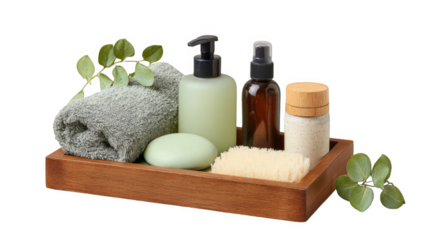 Spa and wellness products arranged on a wooden tray, including a fluffy towel, soap dispenser, spray bottle, bath salts, and green leaves, isolated on transparent background