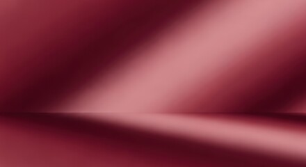 A red and black gradient background with a smooth, glossy surface.