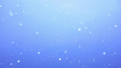 Snow falling on blue sky background, winter season abstract nature scene with white snowflakes in the air
