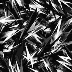 Abstract monochrome seamless pattern with sharp, angular, jagged forms and distressed grunge texture, ideal for modern graphic design backgrounds.