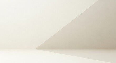 Empty white room with a geometric triangle on the wall.