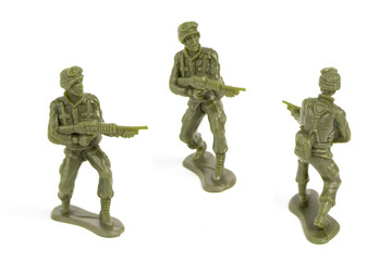 Mini Green Toy Soldiers on white background.