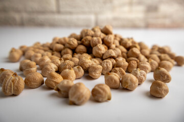 raw chickpeas on a white background