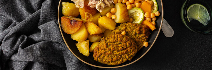 Enjoy a colorful and nutritious breakfast with baked sweet potato, carrots, zucchini, chicken...