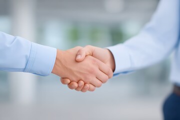 Close-Up of a Confident Business Handshake in a Modern Office Setting for Professional Collaboration and Agreement