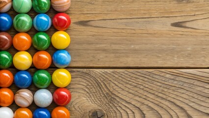 Colorful Marbles Arranged on a Wooden Surface with Natural Lighting and Warm Tones Still Life Composition