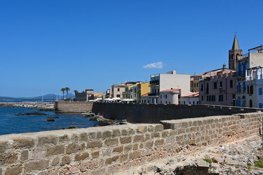 Cityscape of historical part of Alghero town. Waterfront of Alghero town in Sardinia. Alghero old town, street view, Sardinia, Italy