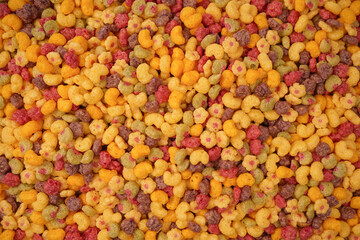 Sweet crunchy cornflakes as a background. Top view.