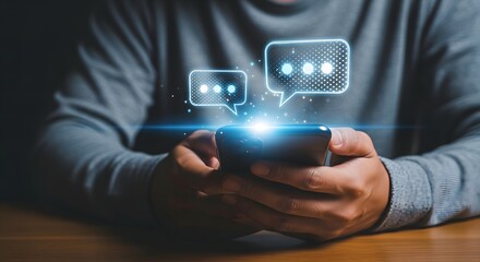 Person holding a smartphone with glowing digital chat bubbles appearing above the screen representing communication